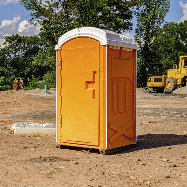 what is the cost difference between standard and deluxe porta potty rentals in New Trenton